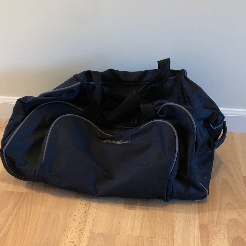 Eddie Bauer Navy wheeled Duffel Bag